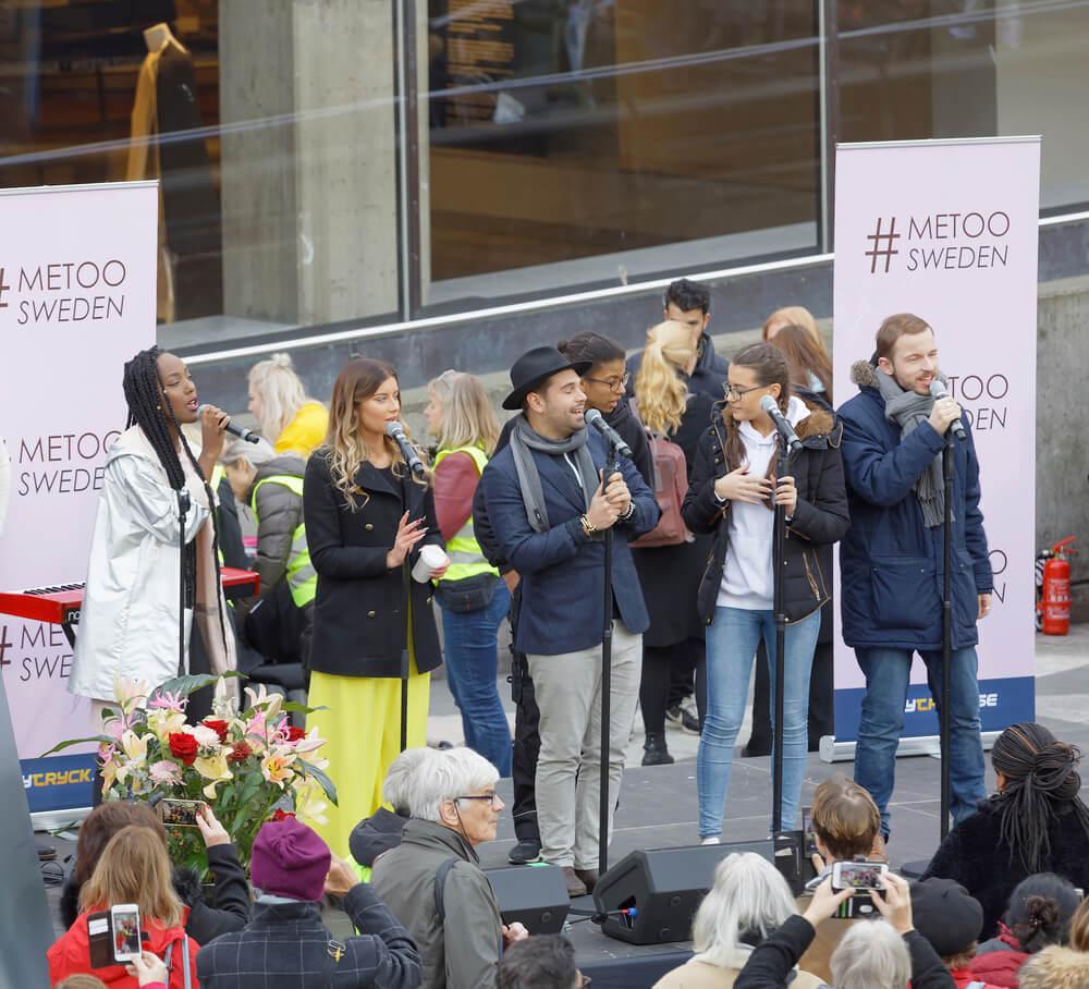 STOCKHOLM, SWEDEN - OCT 22, 2017: Artists from Swedish Idol competition supporting the #metoo campaign against sexual harassment at Sergels torg in Stockholm. October 22, 2017, Sweden