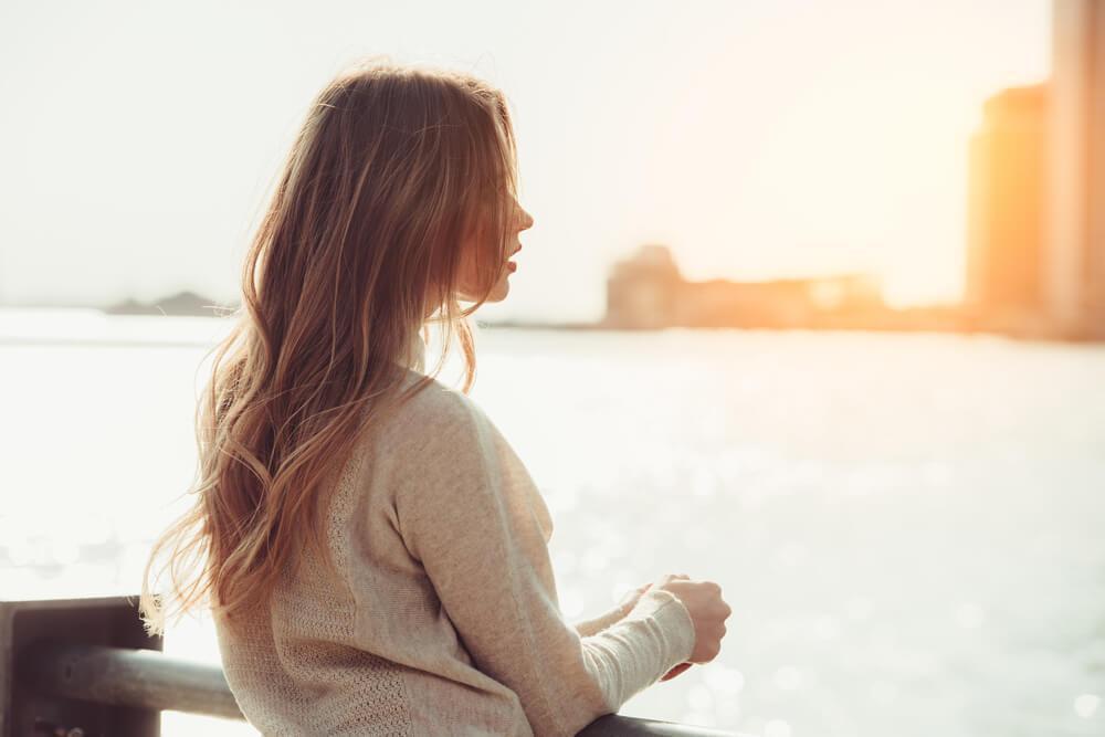 Woman staring into distance