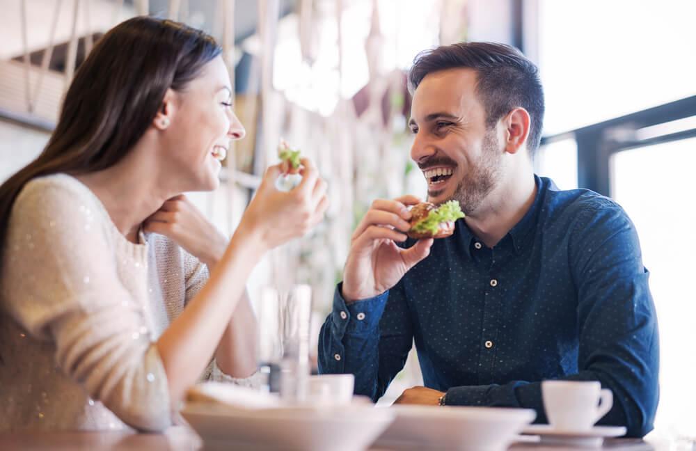 Couple eating at restaurant