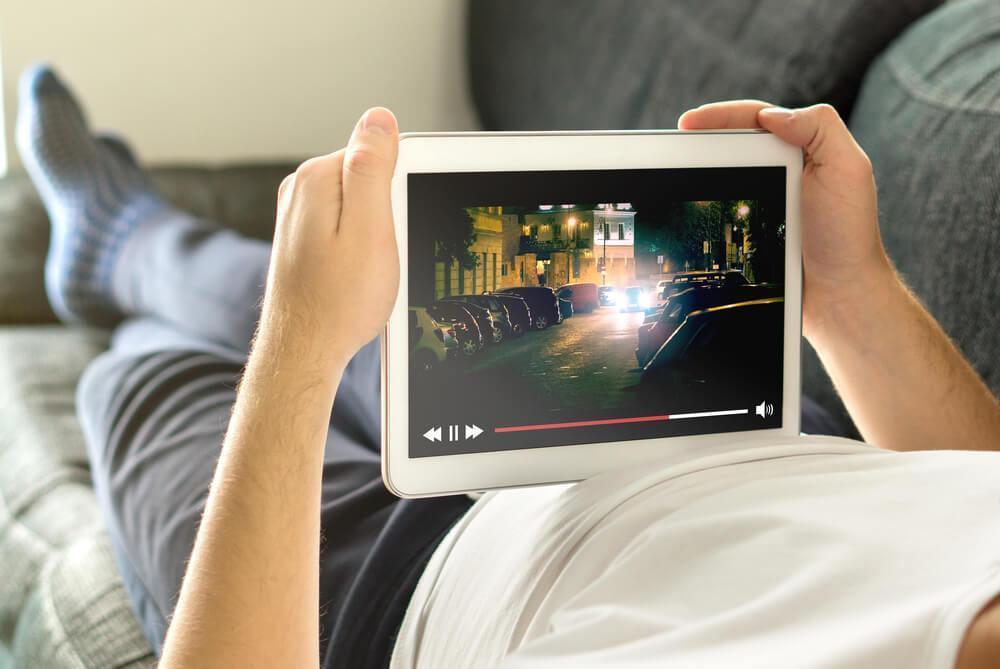 Man watching movie on tablet