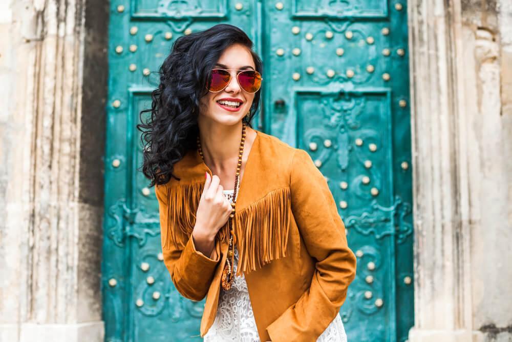 Woman with fringed jacket