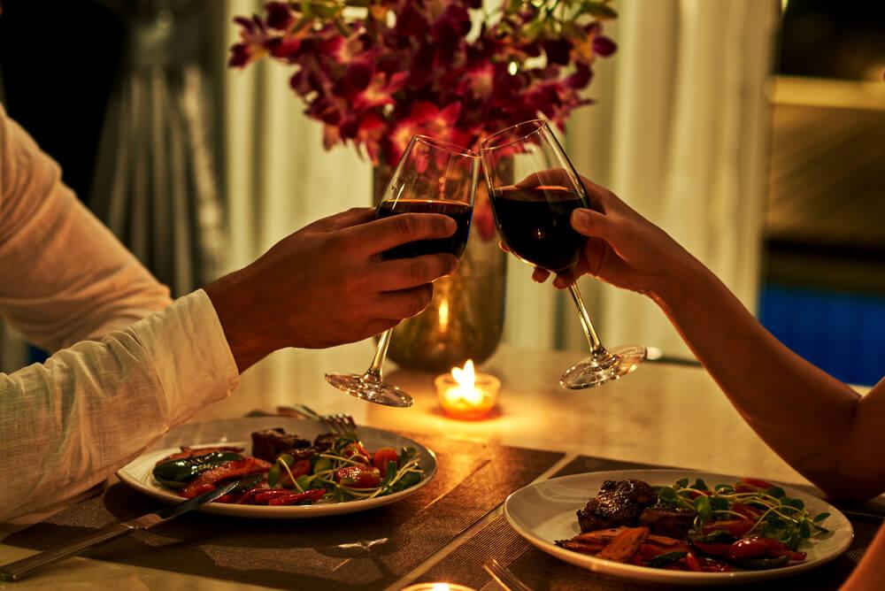 Couple having candlelit meal