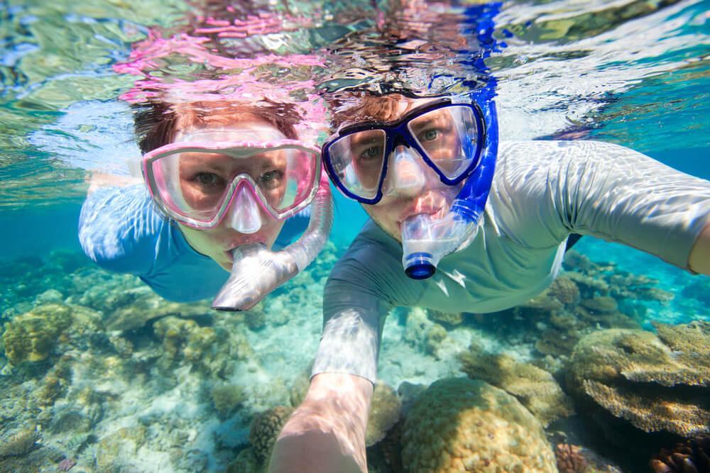 Couple scuba diving