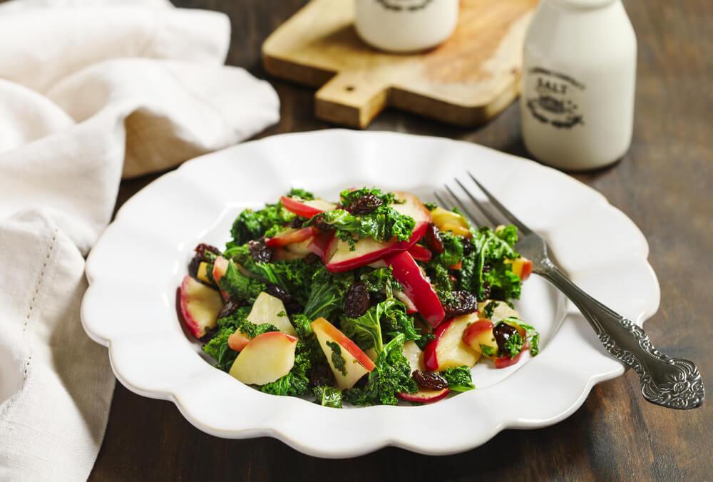 Apple kale salad in bowl