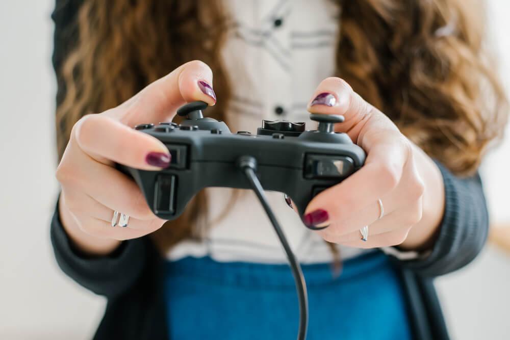Woman with gaming controller