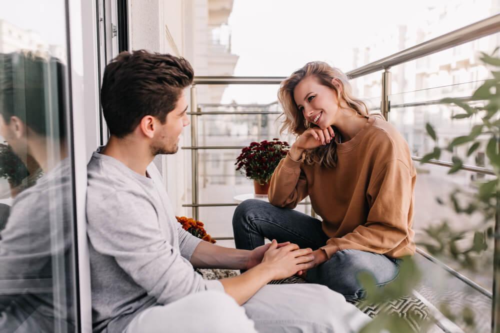 Couple sitting on balcony