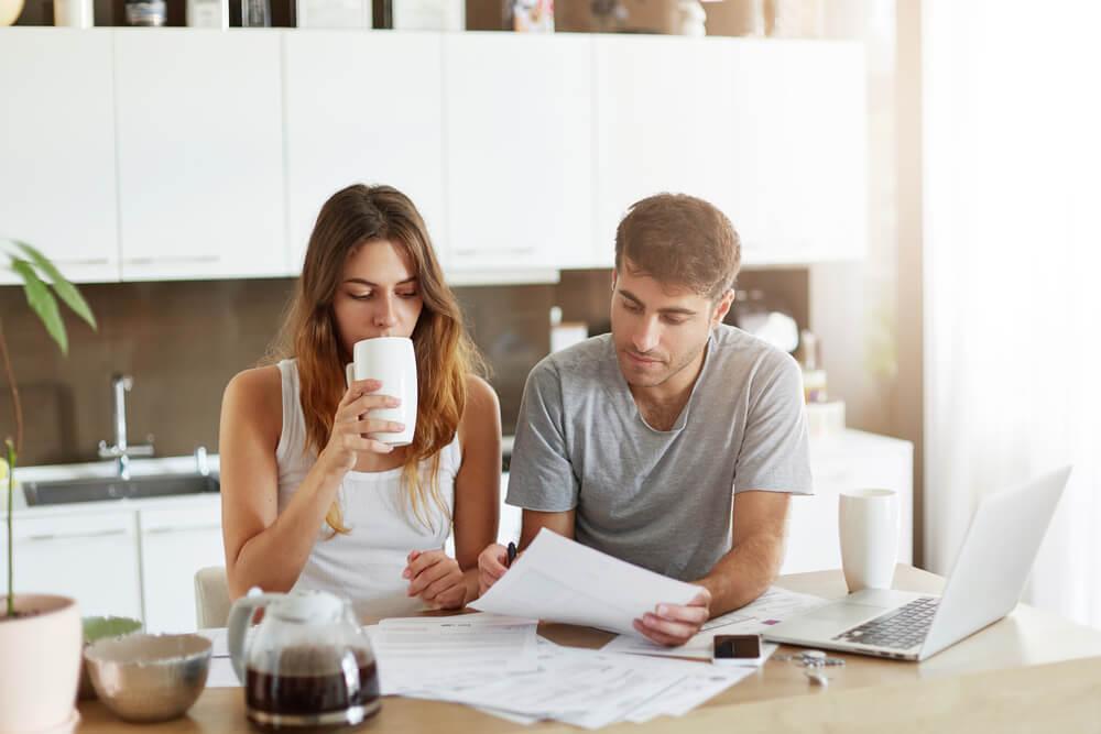 Couple working at table