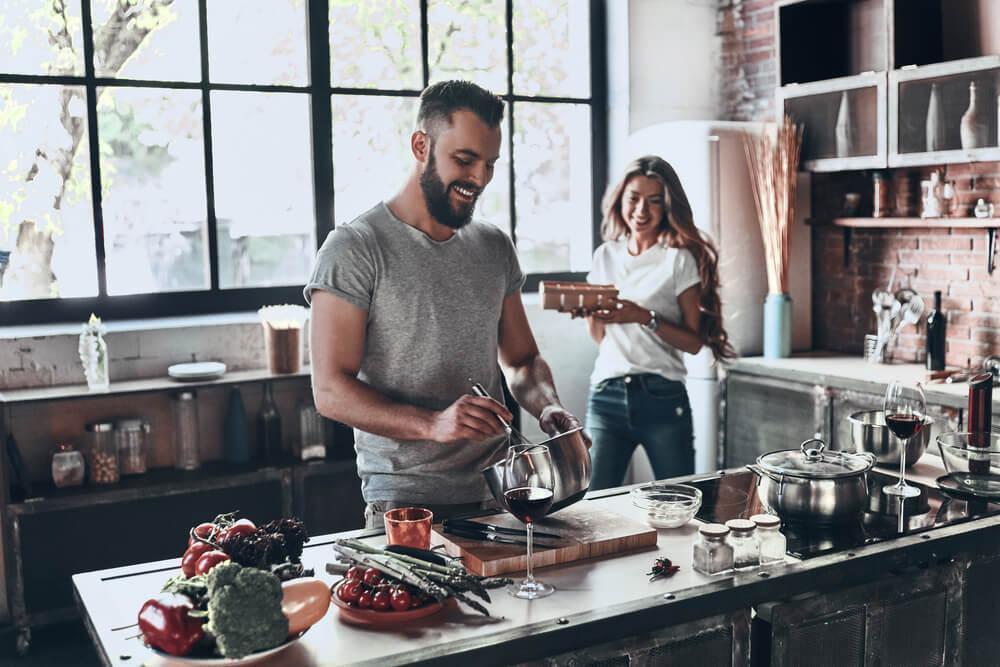 Couple cooking in kitchen