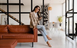 Woman wearing blazer with jeans